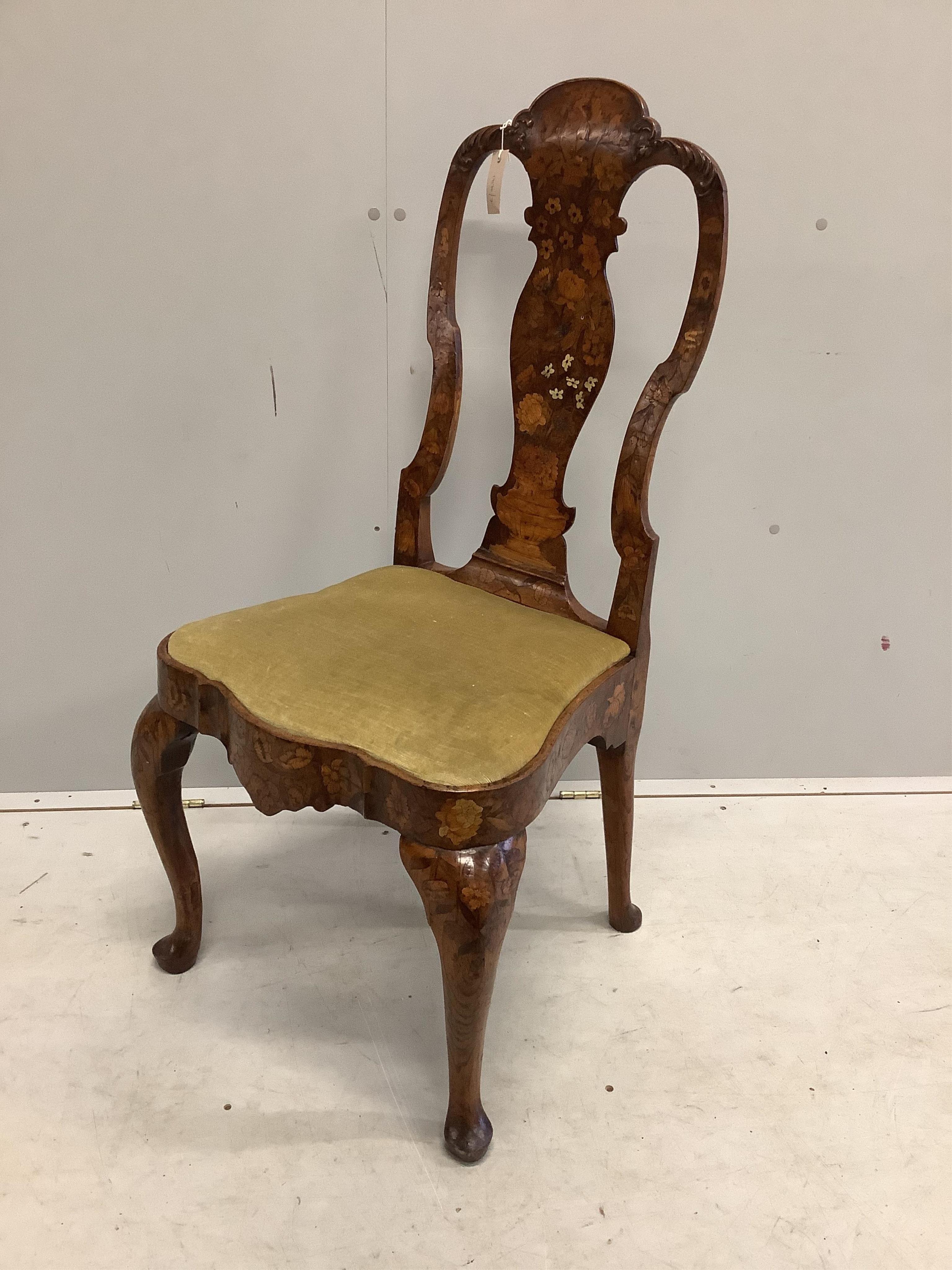 An 18th century Dutch marquetry inlaid dining chair, width 51cm, depth 41cm, height 106cm. Condition - good